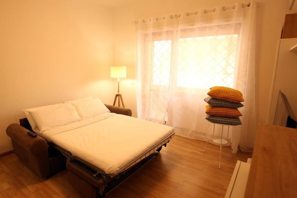 Appartement Cozy Coastal Gateway à Ostie Extérieur photo